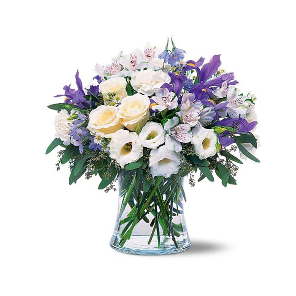 Ce bouquet romantique de fleurs blanches et bleues est parfait pour dire à  votre être cher qu'ils vous fait sentir comme si vous étiez au septième  ciel. Idéal pour les anniversaires.